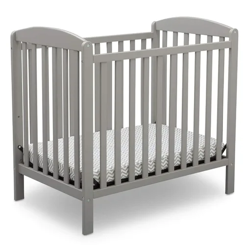 Delta Children Emery - Mini cuna convertible con colchón de 2.75 pulgadas, color gris